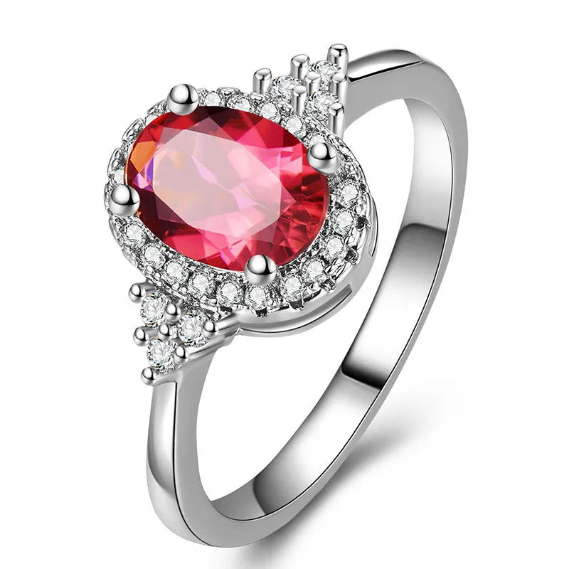 Adjustable oval ruby ring with copper open-mouth band, white gold colour finish, sizes 6 to 10