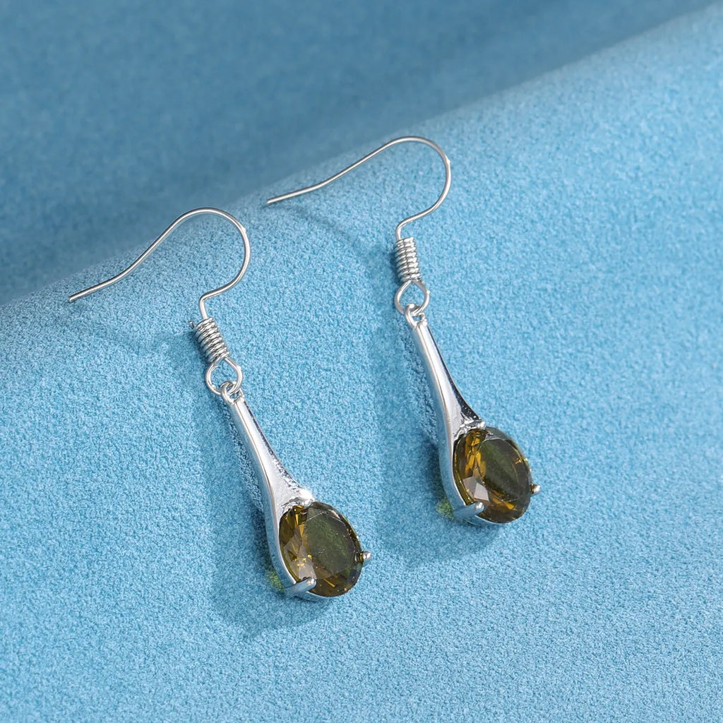 Olive green topaz water drop shaped earrings with retro design and minimalist styling