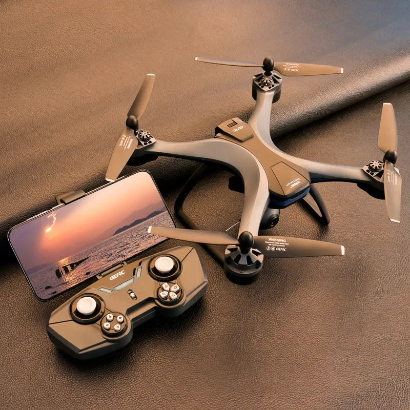 Plastic quadrocopter drone with four rotors, remote controller, spare blades, and protection covers displayed alongside USB cable