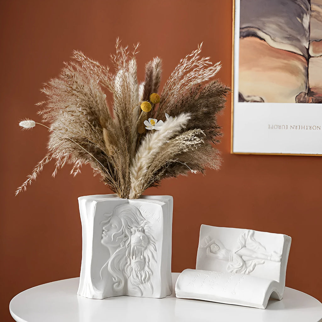 Ceramic book stand with glazed surface in a modern design, displayed on a desktop.