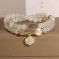 Crystal bracelet with Tianshan jade ginkgo leaf pendant, gold-plated inlay, and rhinestone details