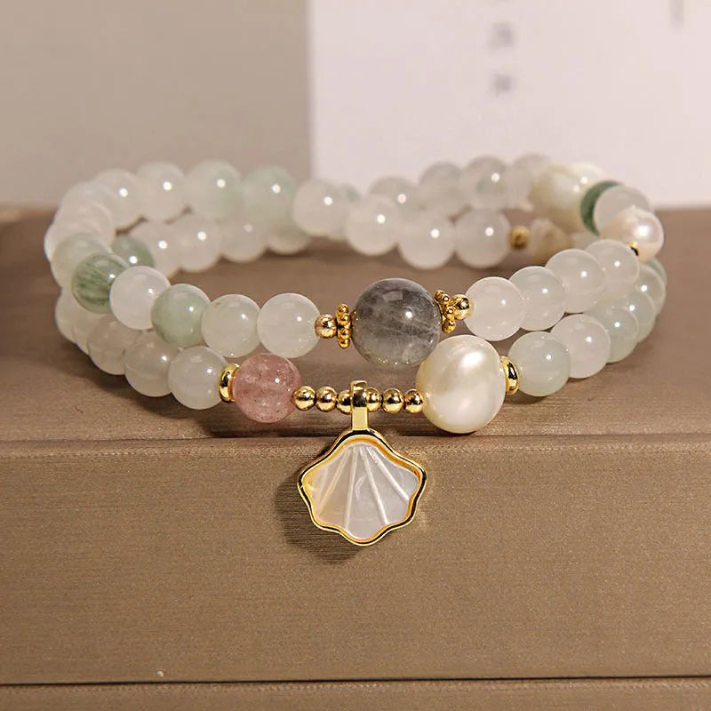 Crystal bracelet with Tianshan jade ginkgo leaf pendant, gold-plated inlay, and rhinestone details