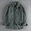 Man wearing a vintage-inspired apricot and brown striped casual shirt with a loose, Japanese retro fit.