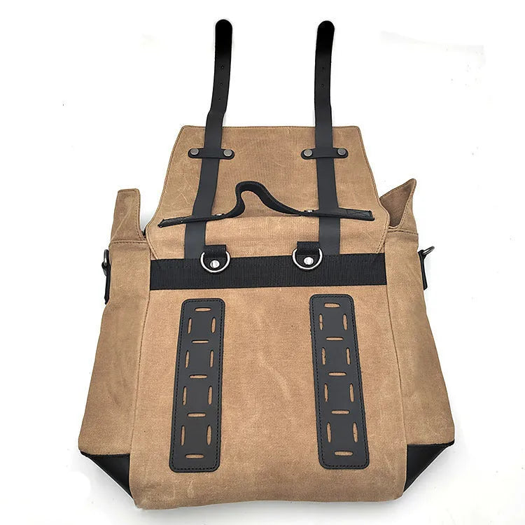 Black waterproof canvas motorcycle side bag with cowhide details mounted on motorcycle