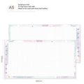 Handbook loose-leaf refill with floral monthly plan sheets in fold-out A7 design