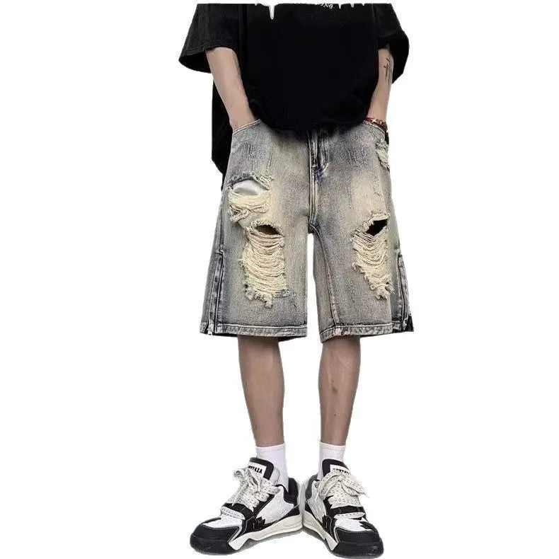 Blue retro tattered denim shorts with wide leg cut and loose fit for women