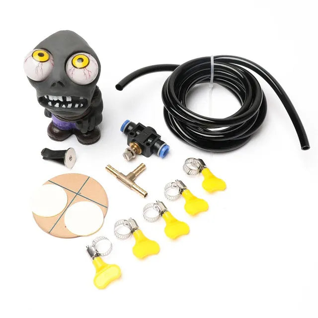 Turbo car blow off valve kit showing rubber doll, pressure regulator valve, copper tube, and clips.