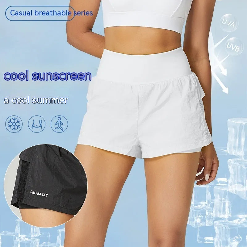 Women's loose-fit cotton blend quick-drying sports shorts in lemon yellow colour.
