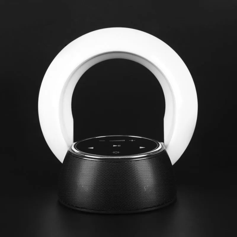 Blue Bluetooth speaker desk lamp with folding design and touch controls showing white, yellow and blue LED lighting