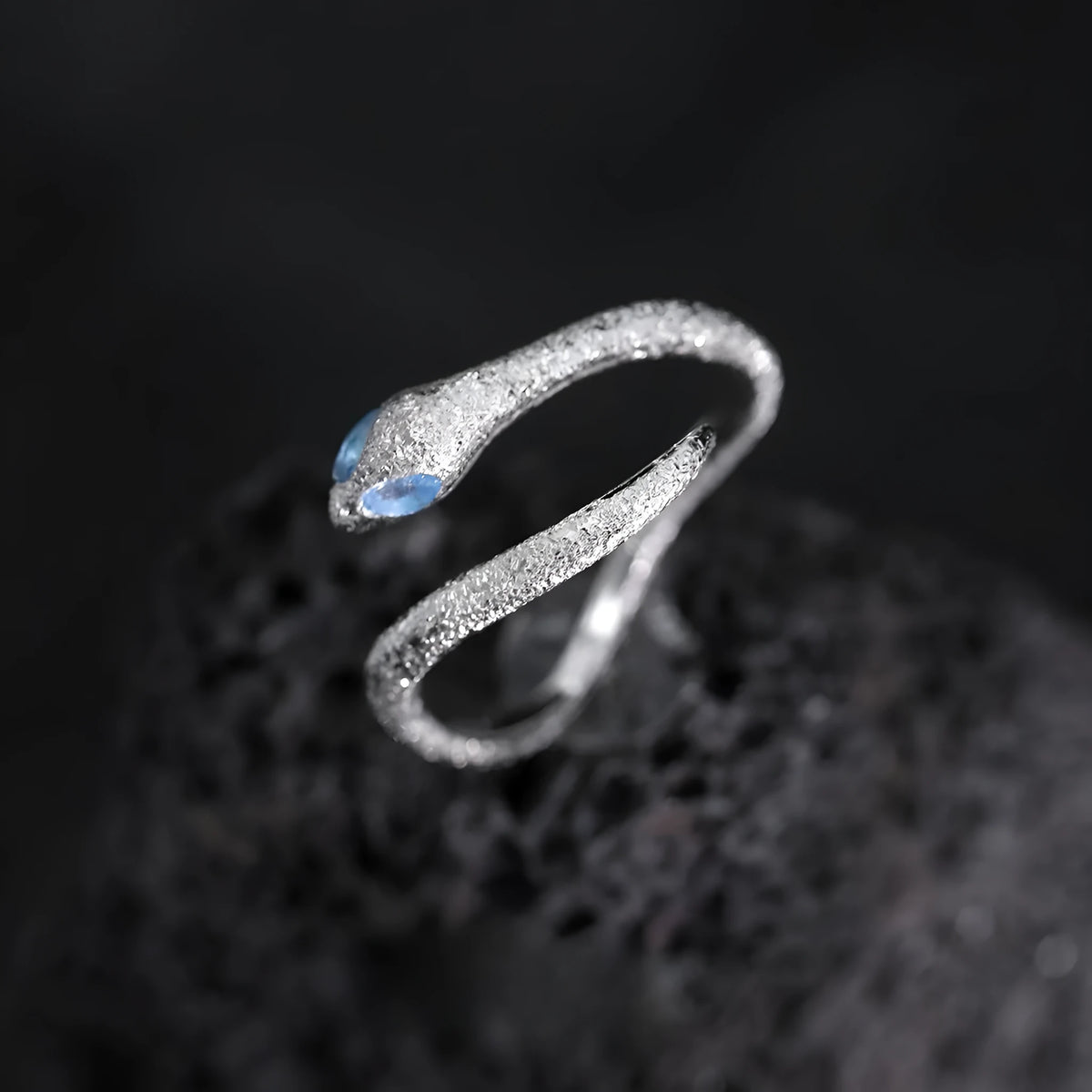 Adjustable silver snake ring with electroplated platinum finish and white gold colour