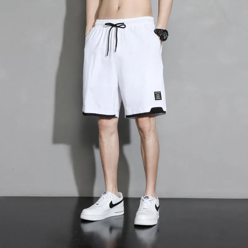 Boys cotton shorts in black, khaki and white colours showing mid waist design and shorts length