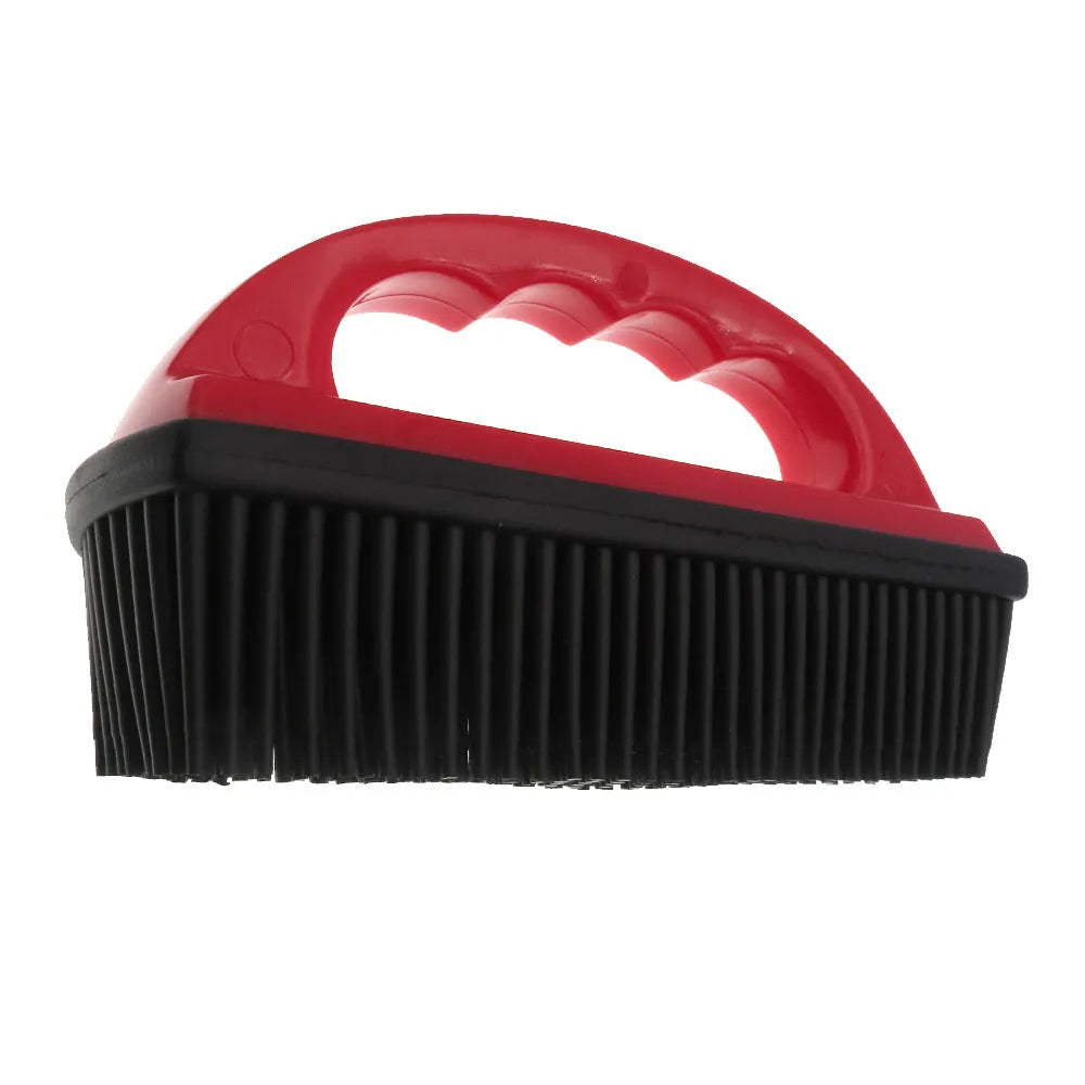 Red pet hair removal brush with silicone bristles and ergonomic handle on a white background.