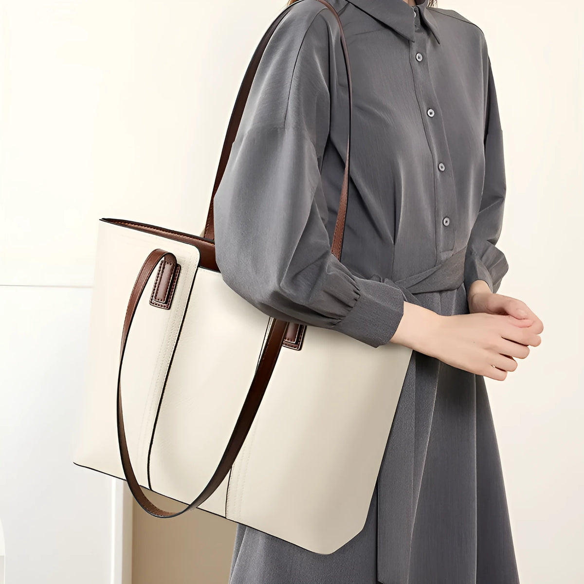 Women's black genuine leather crossbody shoulder bag with multiple internal compartments and a single strap