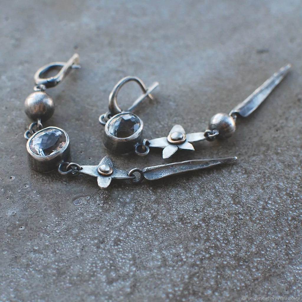 Hesheng geometric long pendant earrings in antique silver colour with rhinestone details