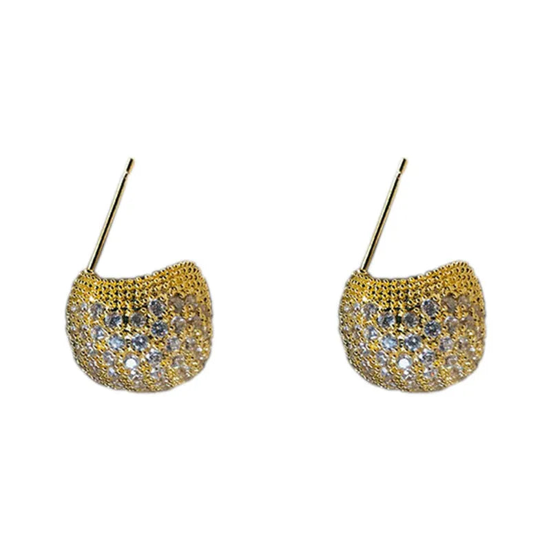 Geometric drop earrings with diamond-encrusted golden beans in gold or white