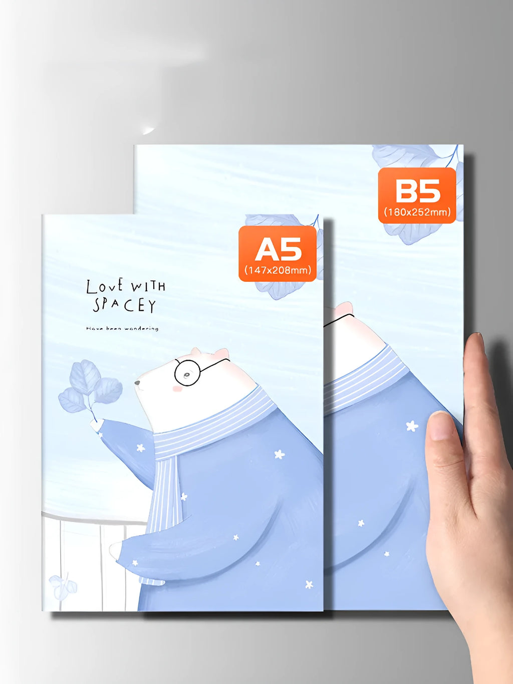 Set of 10 thread-bound soft cover notebooks in A5 and B5 sizes with various designs