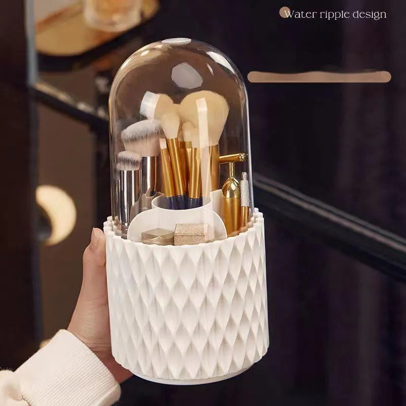 White rotating transparent makeup brush storage organiser with dust cover on desktop
