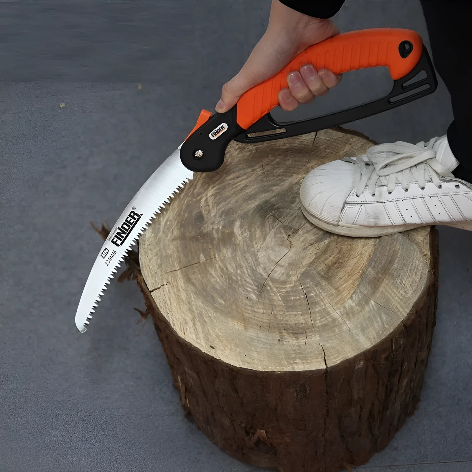 Garden folding hand saw with 9 inch blade, TPR handle, shown in open cutting position