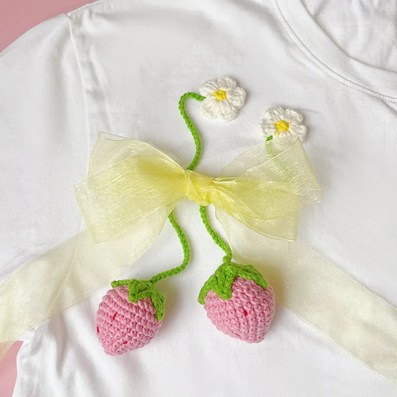 Wool crochet woven strawberry pendant on 35 cm knitted wool cord in pink or red colour