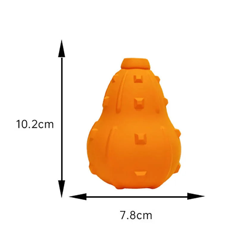 Natural rubber dog toy with longer strap, hollow treat-dispensing centre, for small medium breed dogs.