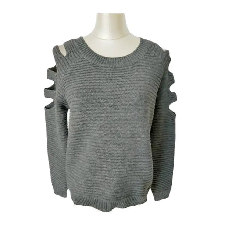 Women's white knitted shirt with hollow-out crochet detail on sleeves and body.