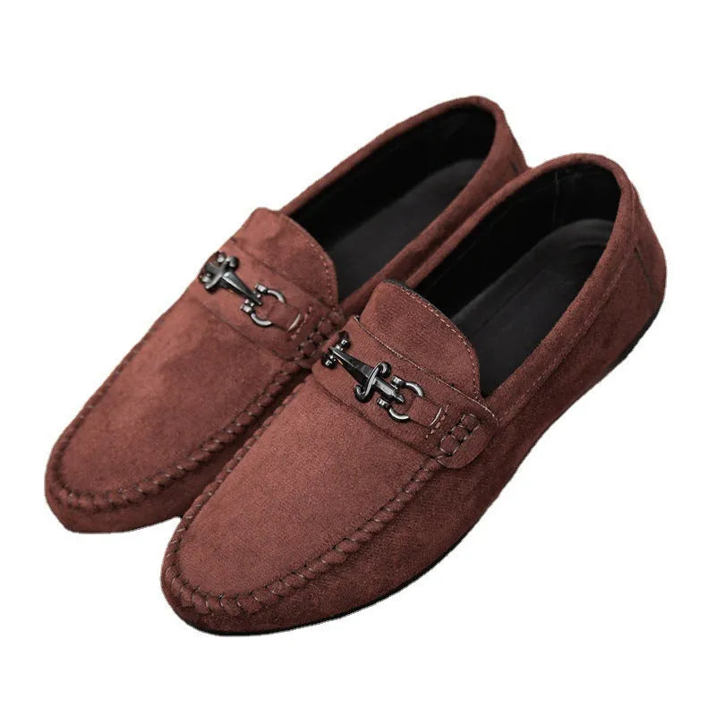 Men's black slip-on loafers with round toe and low heel on a white background