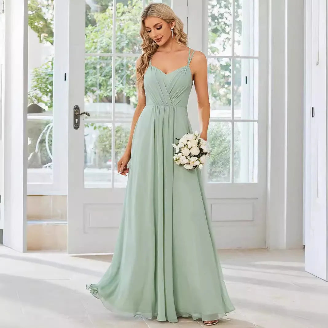 Sleeveless sling neckline banquet dress with long pleated A-line skirt in light green colour