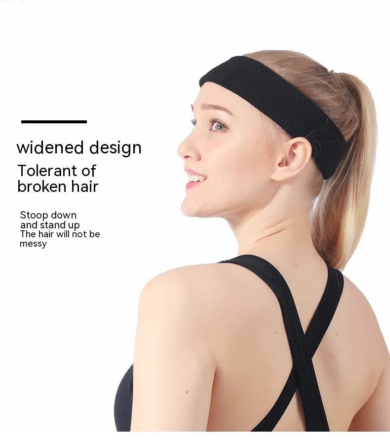 Elastic solid colour sports sweatband in black, shown flat.
