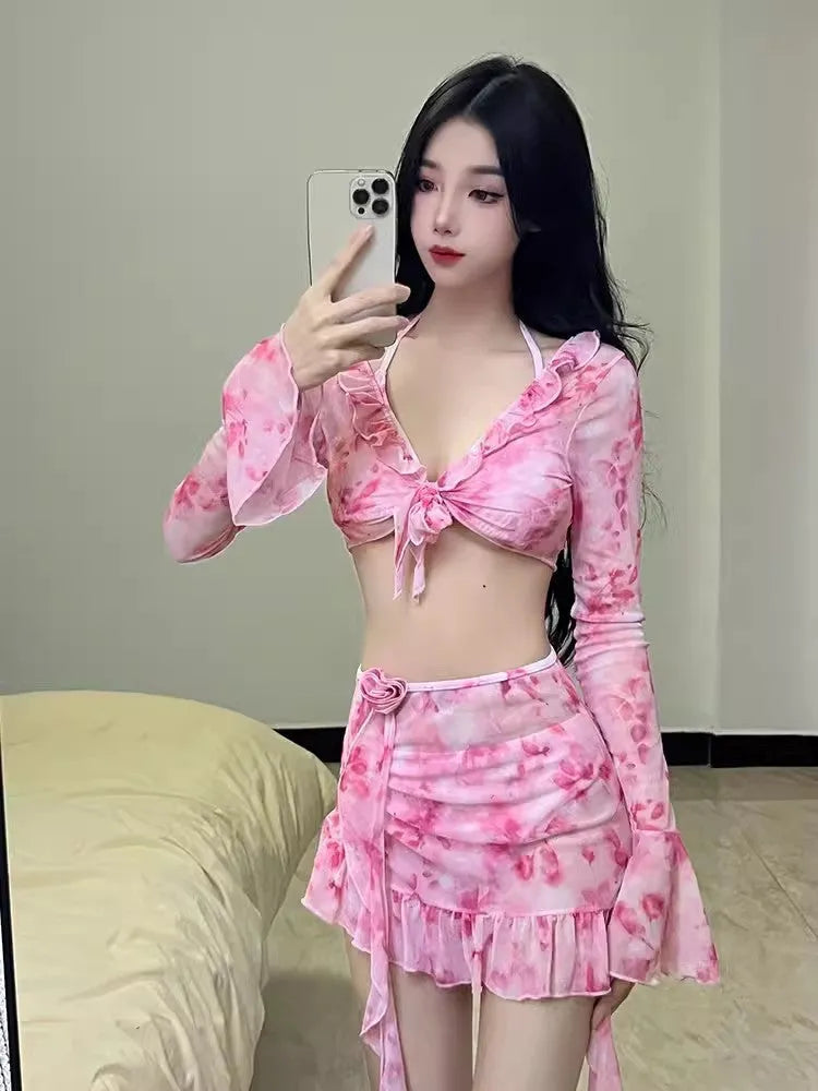 Women's cherry blossom pink floral bikini swimsuit set on a mannequin, showing front and back views.