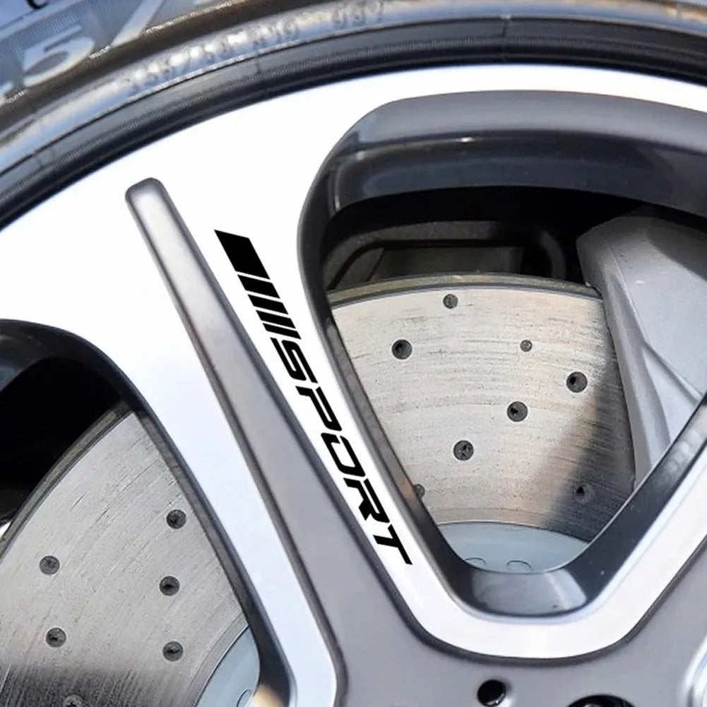 Hollow design black sports car rim sticker on alloy wheel.
