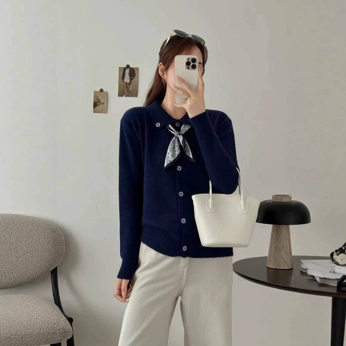 Women's grey lapel scarf cardigan sweater with colour-block panels and long sleeves.