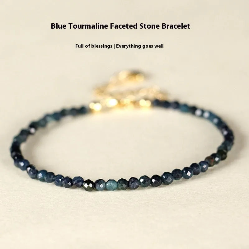 3mm blue tourmaline spacer bead bracelet showing alternating gemstone beads and metal elements
