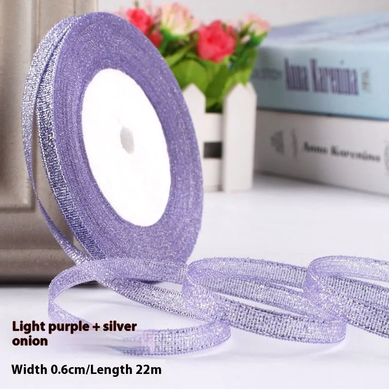 Roll of polyester gift packaging ribbon with 0.6cm width and 22 metre length in various colour options