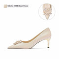 Rhinestone-decorated pointed toe bridal high heels in stiletto and kitten heel styles on a white background.