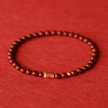 Handmade natural cinnabar bracelet with koi fish and golden ball charms in national style