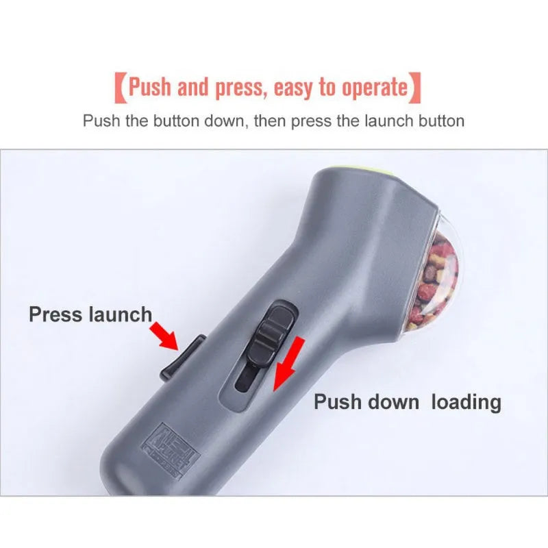Grey plastic pet treat launcher catapult with ergonomic handle for dog and cat training