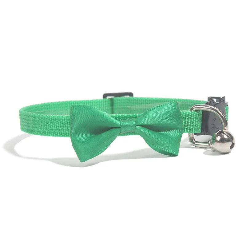 Adjustable nylon cat collar with decorative bow and bell in multiple colour options