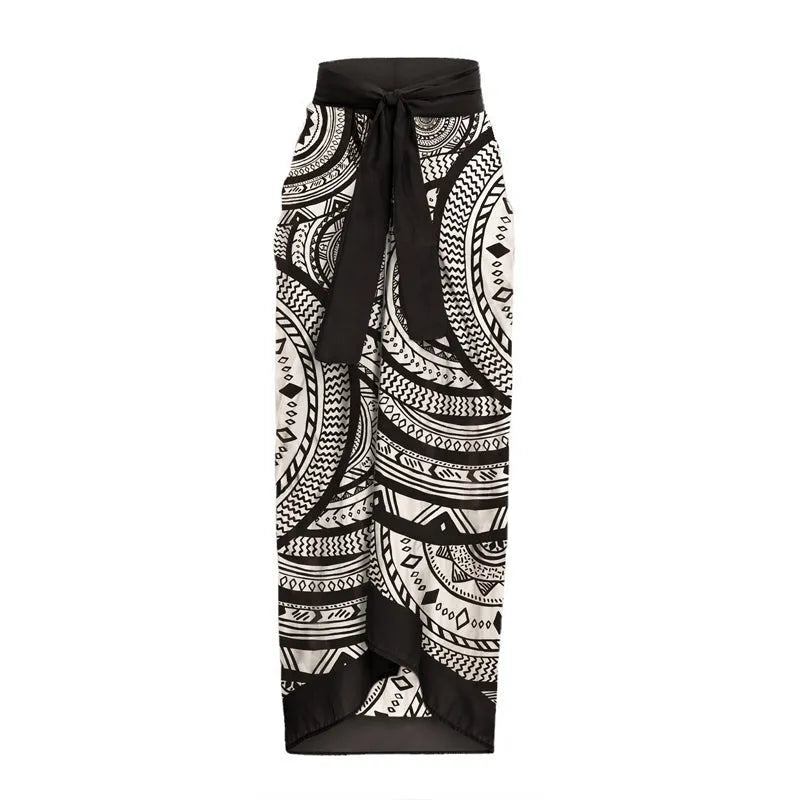 Women's vintage print deep V-neck swimsuit with ruffle detail and matching wrap skirt