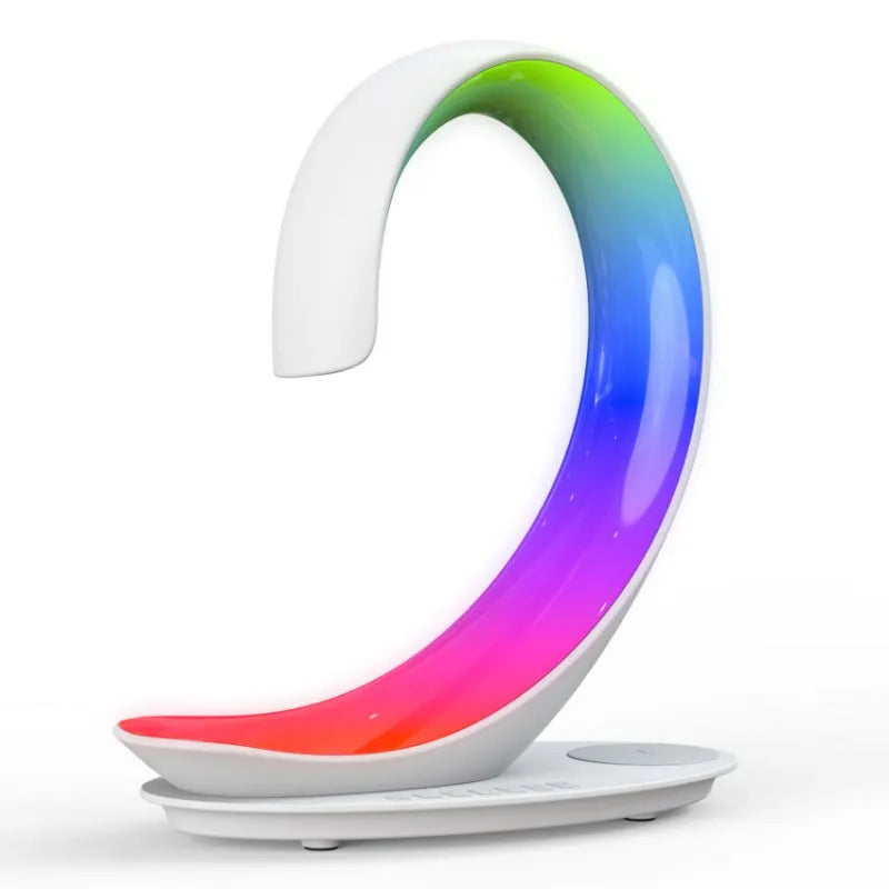 White swan desktop wireless charger with Bluetooth speaker and colourful atmospheric lighting