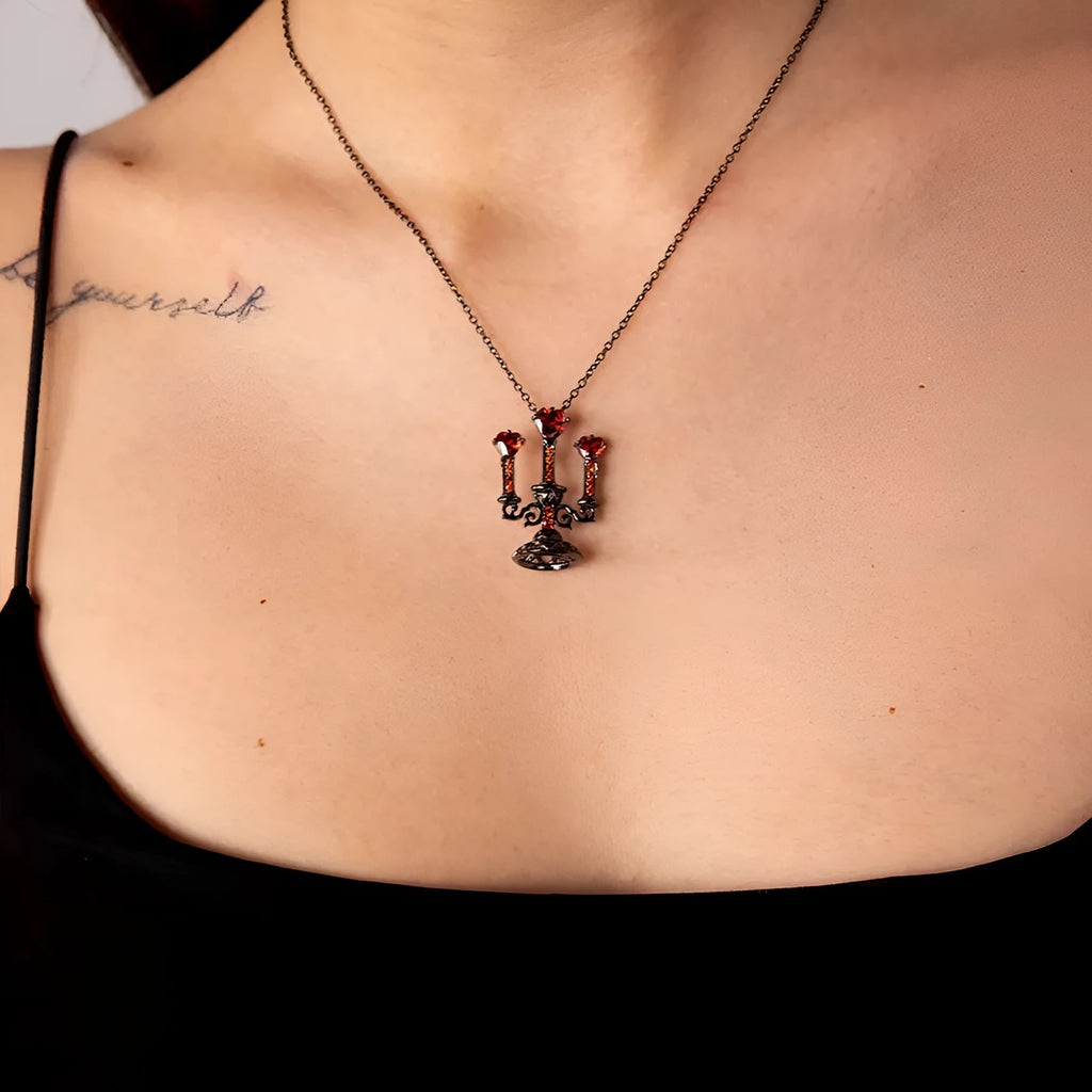 Women's zinc alloy clavicle necklace with a hollow retro candlestick pendant on a cross chain.