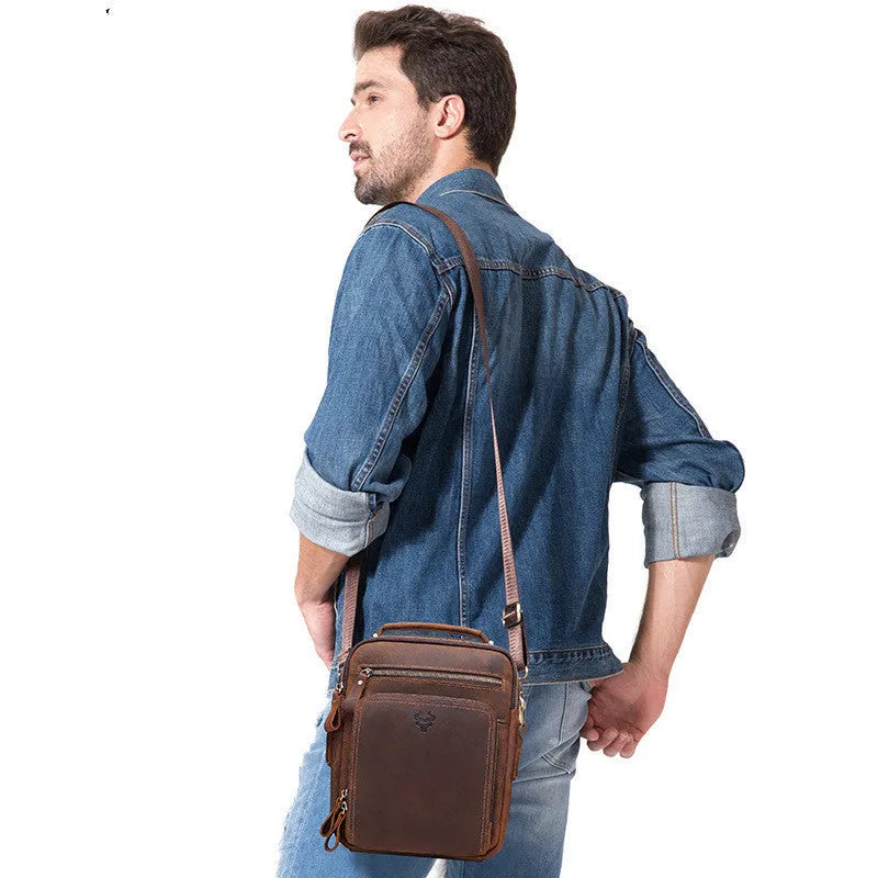 Men's brown leather crossbody bag with single-shoulder strap and retro styling details