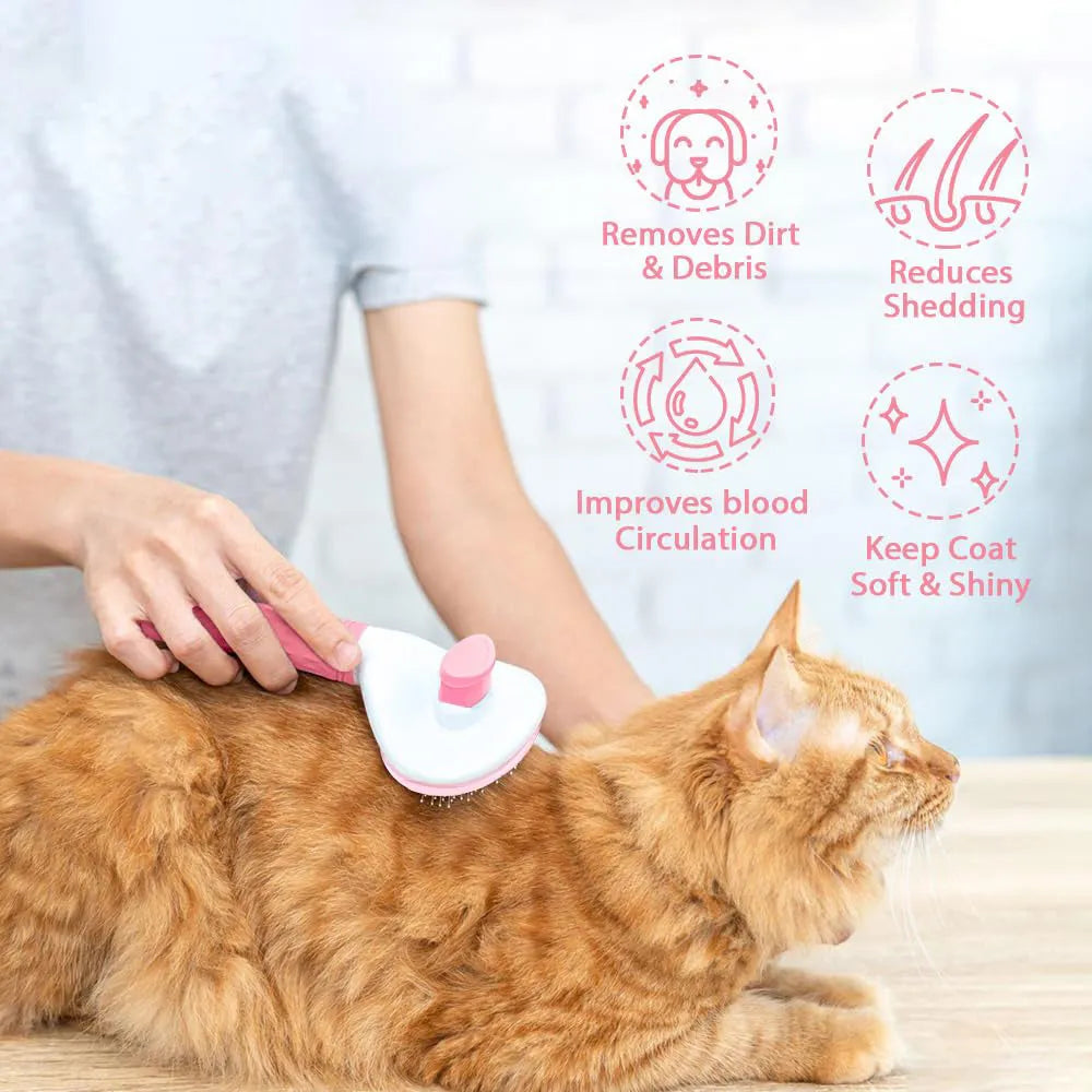 Blue, grey, and pink cat brush with a release button for pet hair removal