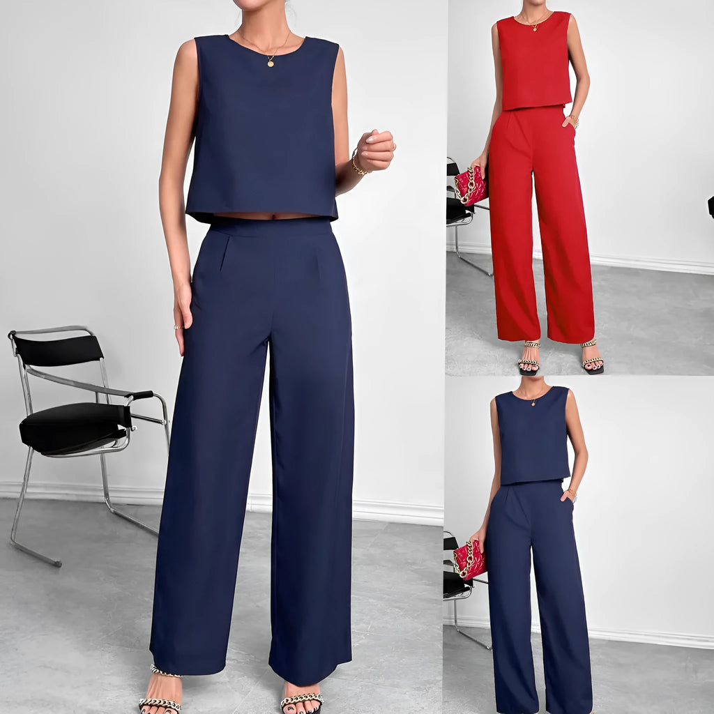 Women's red polyester two-piece set with sleeveless round neck top and wide leg trousers displayed together