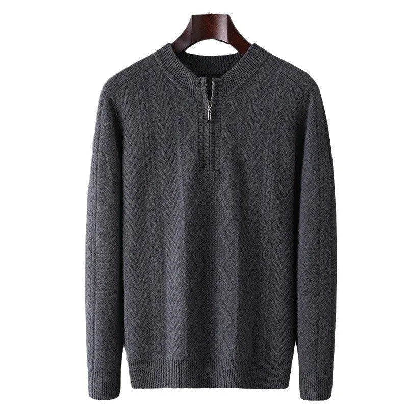 Men's grey diamond pattern wool half-zip sweater laid flat.