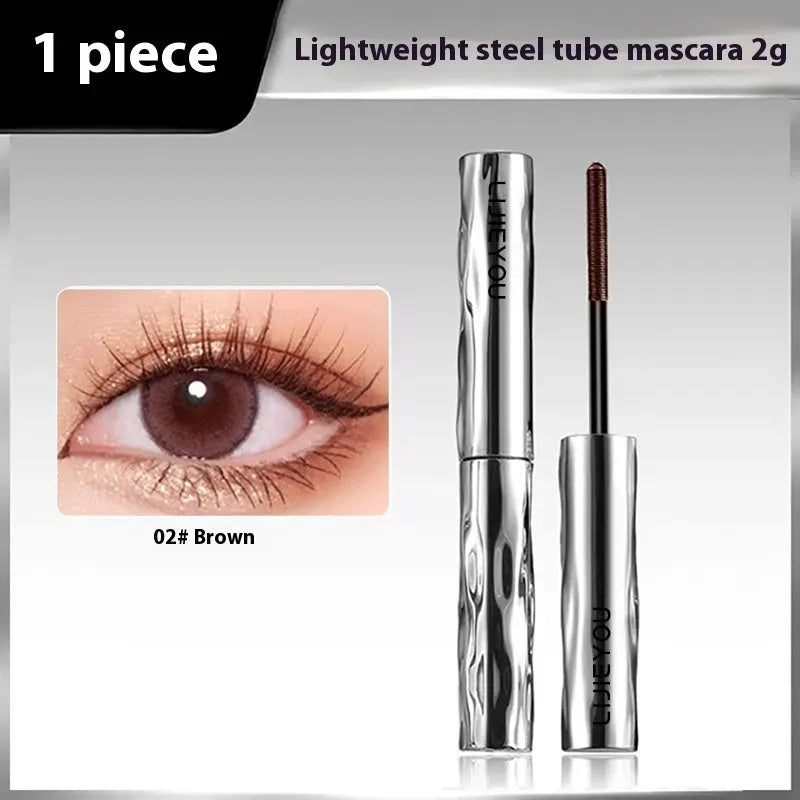Waterproof mascara with steel tube and brush, shown in black and brown colour options, some sets include an eyelash curler.