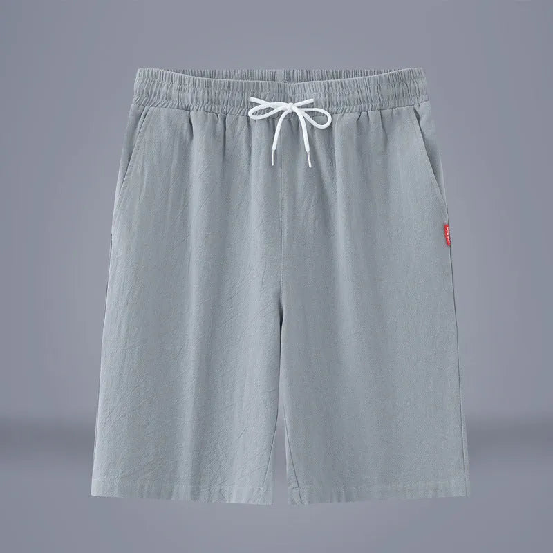 Cotton and linen cropped summer pants in a solid colour with a drawstring waist.