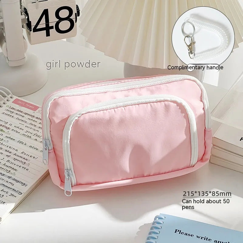 Double-layer pencil case in solid colour with gift handle showing dimensions 215mm x 135mm x 85mm