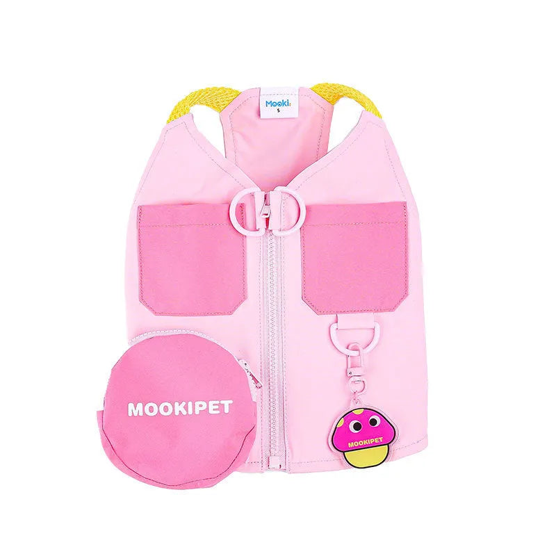 Pink polyester traction vest for a small white dog on a grey background.