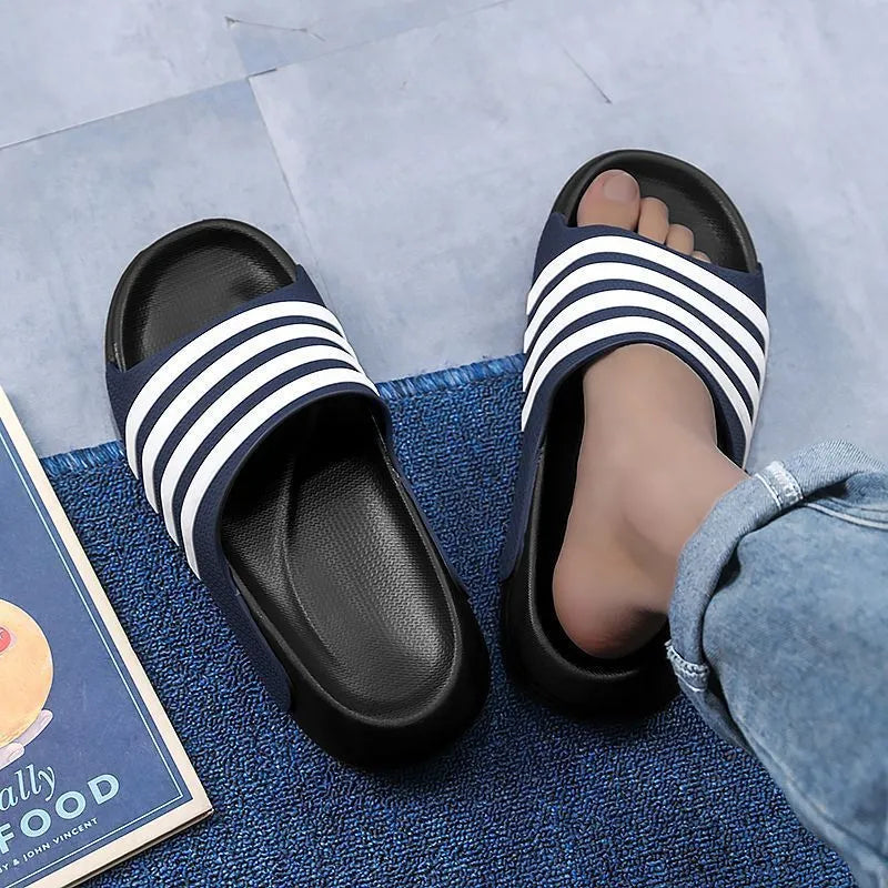 A pair of casual unisex slippers with a PVC upper and EVA sole, shown in one of four available colour options.