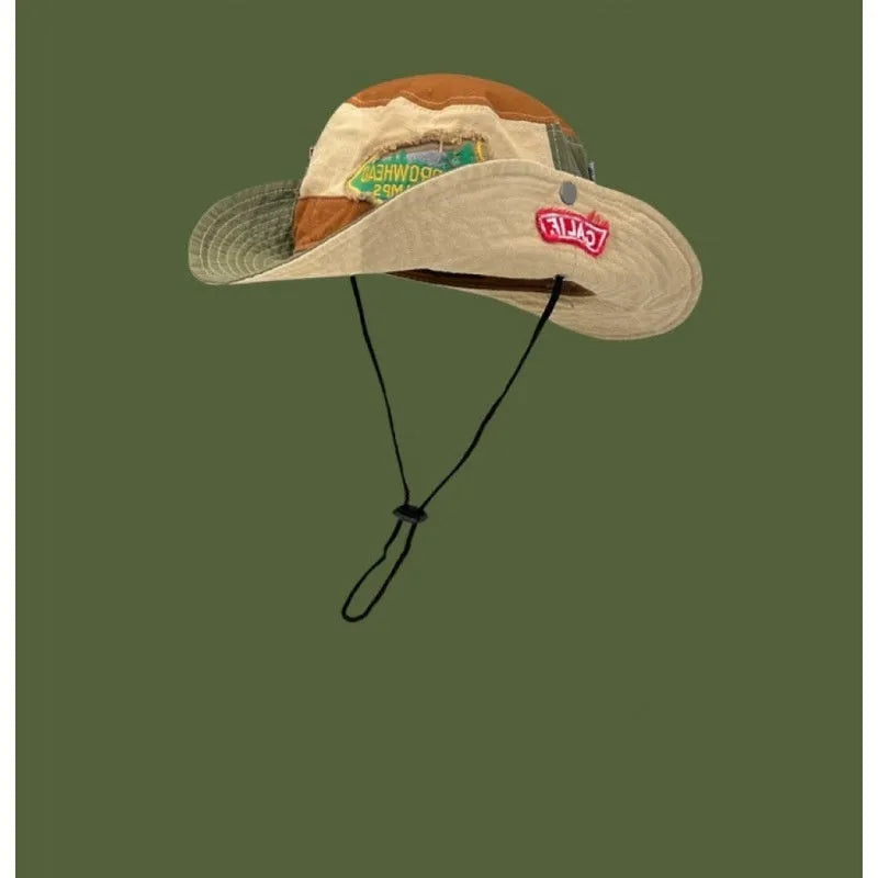 Army green cotton fisherman hat with hand-painted patchwork and flat top crown